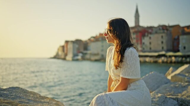 Woman Enjoying Rovinj Croatia Sunset on Adriatic Coast 4K Travel Lifestyle