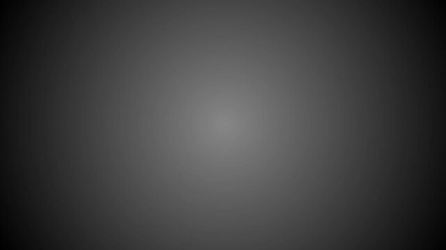 Abstract dark gray gradient background motion with soft radial light.
