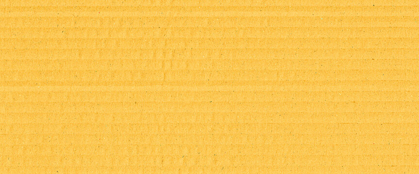 Old vintage blank yellow striped craft paper, kraft paper, cardboard material, grunge pattern, carton box texture background