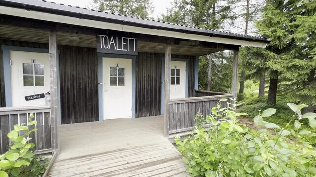 Public restroom and water refill station at the top of Skuleberget mountain in Sweden, serving hikers and visitors.