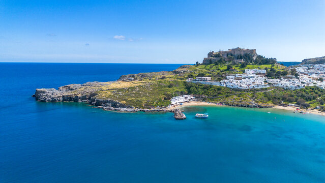 Panoramic aerial view of Acropolis of Lindos medieval fortress and traditional white village on Rhodes island Greece