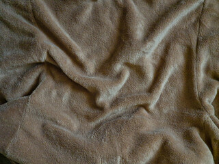 Soft fluffy brown faux fur fabric texture background close up full frame © Kateryna Zinenko 