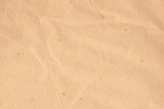 Old aged rustic vintage paper cardboard carton document texture - Blank wrinkled crumpled beige parchment background for letter or any creative project