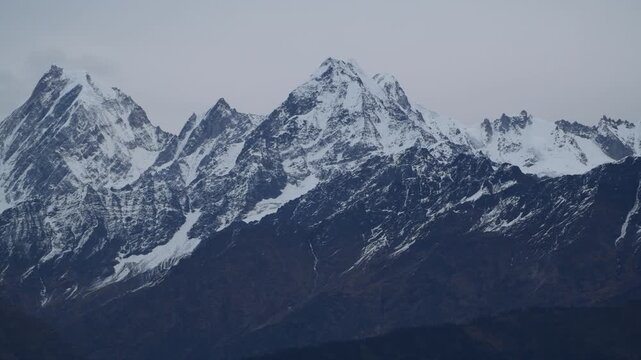 Cinematic Telephoto Pan Across Massive Himalayan Glaciers And Snow Peaks