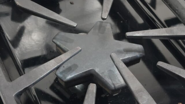 Lighting a gas stovetop burner