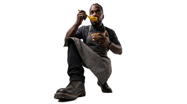 Martial artist performing high kick in combat stance. Dynamic male fighter executing powerful karate move against white background.