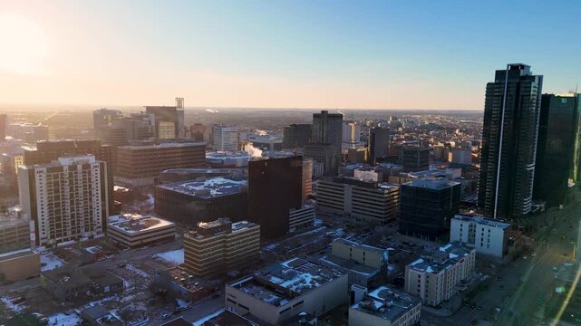 Drone footage capturing the essence of Winnipeg, Manitoba, with panoramic views of the downtown core, modern high rise buildings
