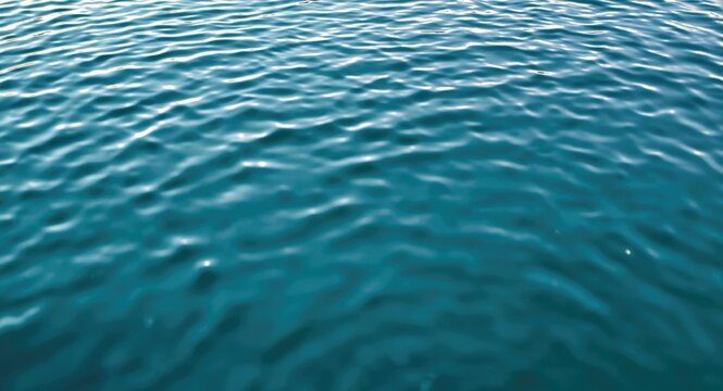 Rippling Ocean Water Surface in Deep Teal Color with Soft Light
