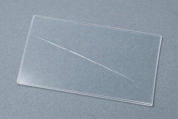 Fototapeta premium A piece of transparent plastic resting on a table