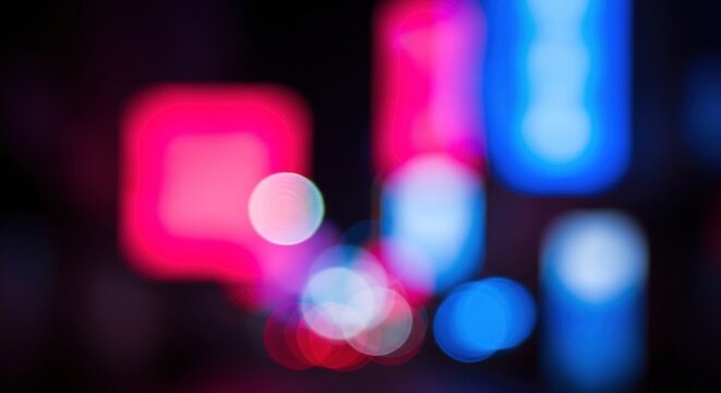 Colorful bokeh light background with glowing orbs. Soft focus abstract illumination for creative design projects.