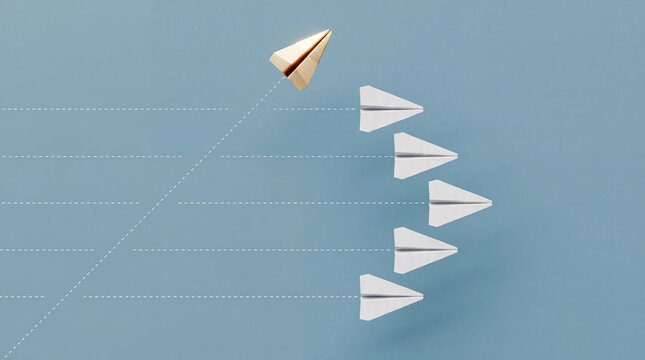 A single gold paper airplane breaks away from a line of white paper airplanes, symbolizing leadership and individuality.