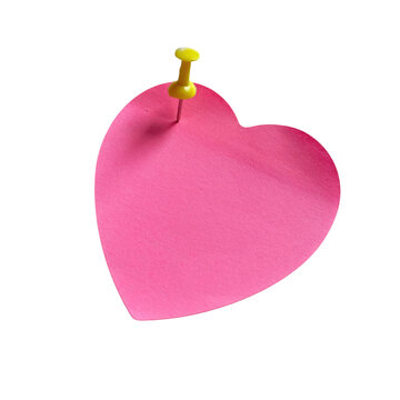 Pink heart shaped sticky note pinned with a small yellow thumb tack