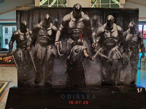 Ostia, Rome, Italy - July 22, 2026, advertising panel for director Christopher Nolan's film Odyssey, shot entirely with an IMAX camera, at Cineland Multiplex, Ostia's main multiplex cinema.