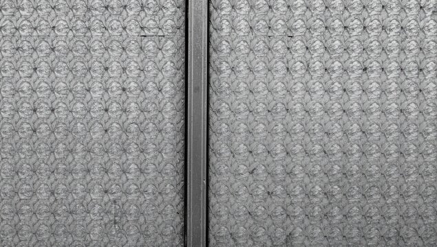 Textured Bubble Wrap Background with Gray Tones and Symmetrical Pattern
