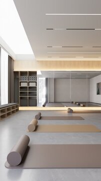Modern minimalist yoga studio interior with neutral toned mats and bolsters