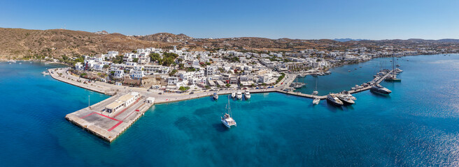 Fototapeta premium Panoramic aerial view of Adamas port and town, Milos island, Greece