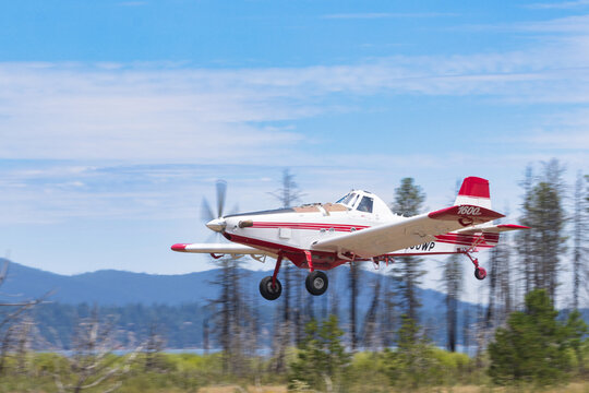 CHESTER, CALIFORNIA - JULY 19, 2026: AT-802 Tanker 830 on final approach at Rogers Field during Biscar Fire aerial firefighting operations.