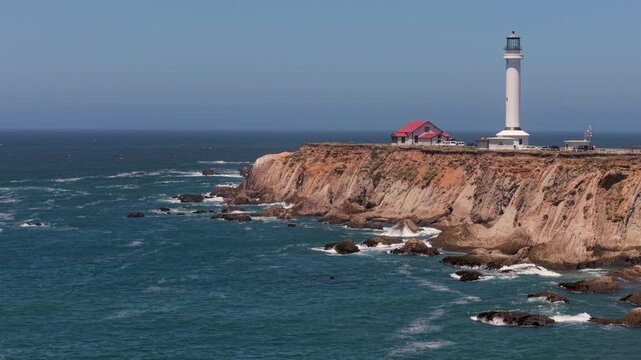Explore the cliffs and ocean surrounding Point Arena Lighthouse on the Pacific coast of California with aerial views of the area.