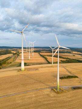 Wind turbine park, agriculture field, clouds, windmills, efficiency renewable sustainable energy, electricity technology, environment conversation