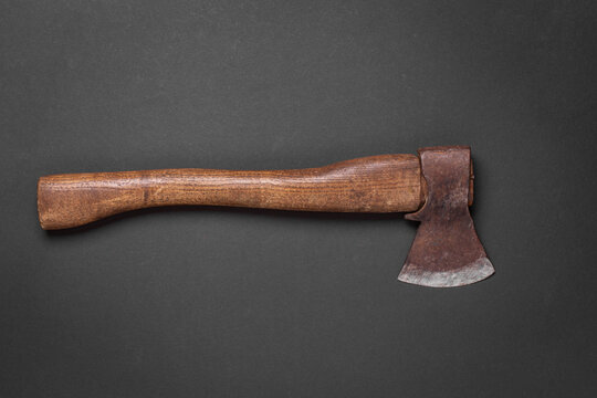 Vintage Axe with Wooden Handle on Black Background