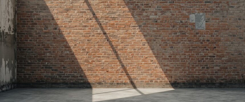 Sunlight Casting Shadows on a Rustic Brick Wall in an Empty Room
