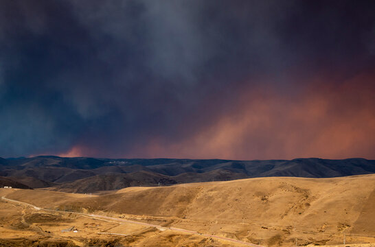 moke and pollutants generated by wildfires obscured the sky.