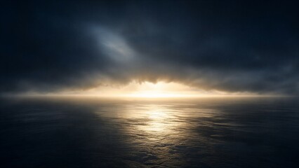 Fototapeta premium Bright light breaking through dark storm clouds above the ocean. Concept of divine creation or genesis. Dramatic biblical atmosphere represented by sun ray illuminating the water surface.