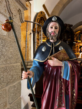 Statue of Saint James as pilgrim with staff on Camino de Santiago