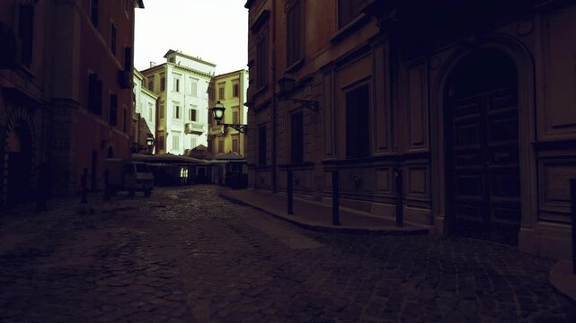 lonely silhouette on wet cobblestones, figure paused near doorway under deep shadow, distant pale sky framing narrow facades, mood of introspection and urban