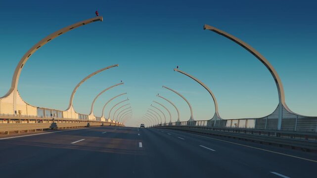 Saint-Petersburg, Russia - July 17 2026, 4k, panoramic view from the window of a moving car of the Western High-Speed ​​Diameter (WHSD) highway, at daytime with clear blue sky, St. Petersburg, Russia