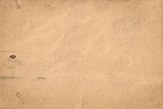 empty textured pattern background design for craft projects - Abstract old aged vintage retro beige handmade paper cardboard craft paper texture with recycled inclusions, subtle fiber and flecks