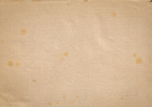 empty textured pattern background design for craft projects - Abstract old aged vintage retro beige handmade paper cardboard craft paper texture with recycled inclusions, subtle fiber and flecks