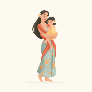 Mother holding baby in Tahitian dress