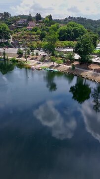 Establishing Shot of Tamego River with Poldras, Amarante, Portugal
