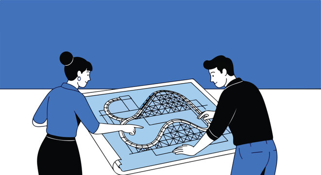 Two people examining a blueprint of a roller coaster