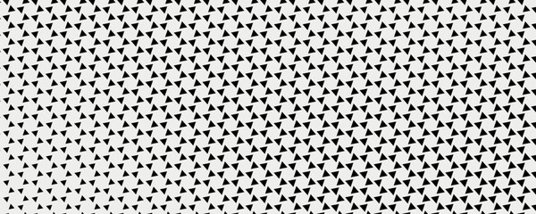 Black and white chess triangles. A vector of identical black triangles on a white canvas. Vector decor with triangles. © yakult
