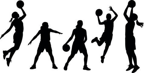  Women basketball players silhouettes set in different action poses dribbling shooting and jumping for competition graphics. © MDFARIDUR