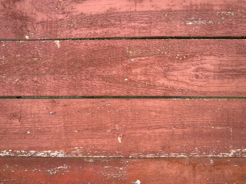 Rustic red weathered wood planks surface texture