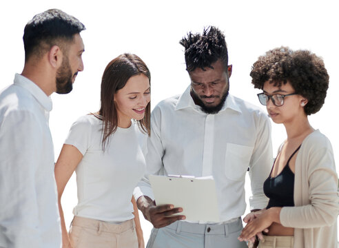 Employees working at computer together, discussing content