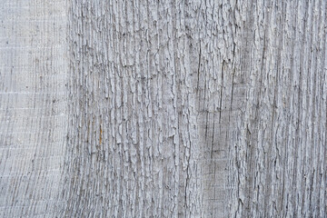 Fototapeta premium Weathered wood surface with vertical grain patterns