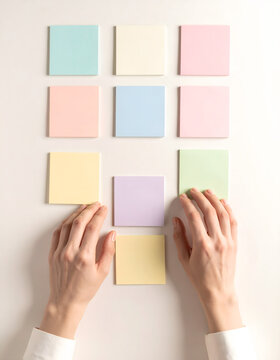 Hands arranging colorful sticky notes into calm neat pattern creating focused peaceful mood generative AI