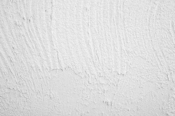 Rough white concrete wall surface detail © reddish