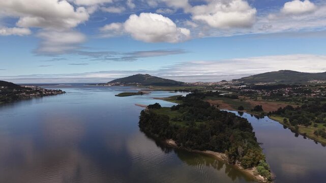 Rio mi&ntilde;o river emptying into the atlantic ocean, forming an estuary separating spain and portugal