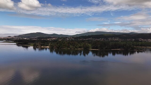 Rio mi&ntilde;o river emptying into the atlantic ocean, forming an estuary separating spain and portugal