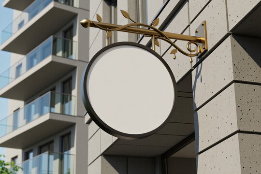 Round blank hanging signboard mockup on modern grey building facade wall. Empty outdoor shop store sign with decorative gold vine metal bracket. Minimalist commercial street display template for