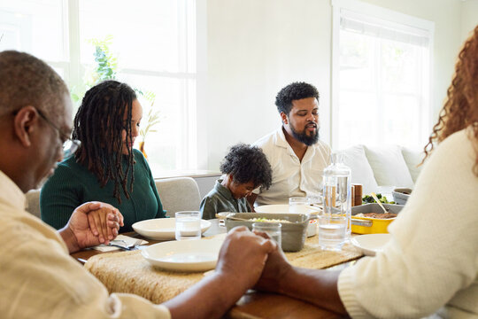 Family blessing before the meal.