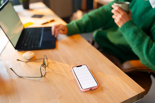 A Desk with Coffee and Technology