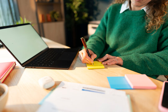 Writing Notes While Working