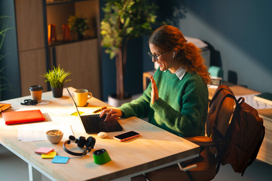 Smiling During a Virtual Team Meeting