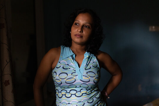 Portrait of an Indian woman wearing western outfits at indoors